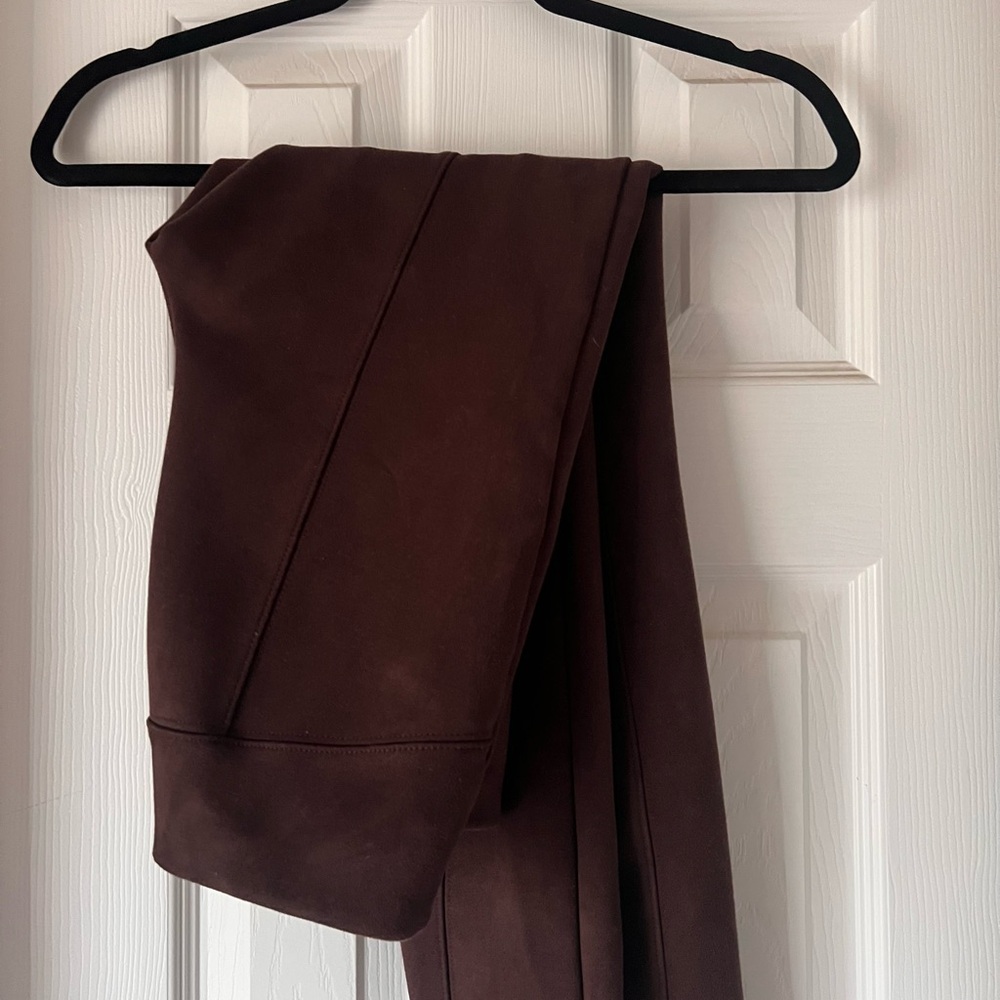 Anthropologie velvet stretch pants with zipper adjustable flare bottoms. Size 27
